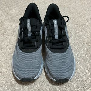 Nike Revolution Men’s running shoe. Size 11.5. New condition.